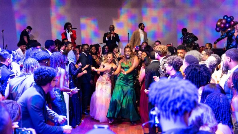  A group of young people dance in a circle at Virginia Tech's Black Excellence Gala in 2022.